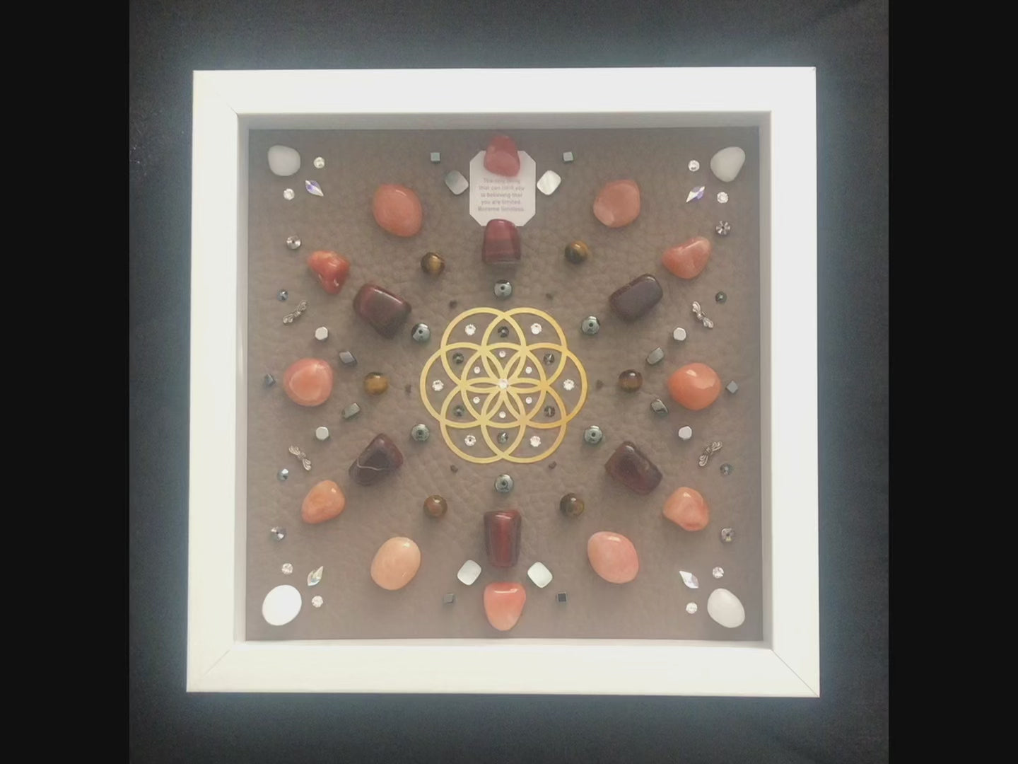 shadow box art, 18K gold Flower of Life sacred geometry medallion, Natuzzi Italia genuine leather, crystals, Swarovski crystals, gemstones, gems, sacred geometry, healing art, crystal art, crystal grid, energy healing, crystal healing, crystal energy, crystal grid, healing, healing energy, healing art, sacred geometry, handmade, luxury art, Orange Aventurine, Red Tiger Eye, Tiger Eye, King Quartz, Hematite, Mother of Pearl